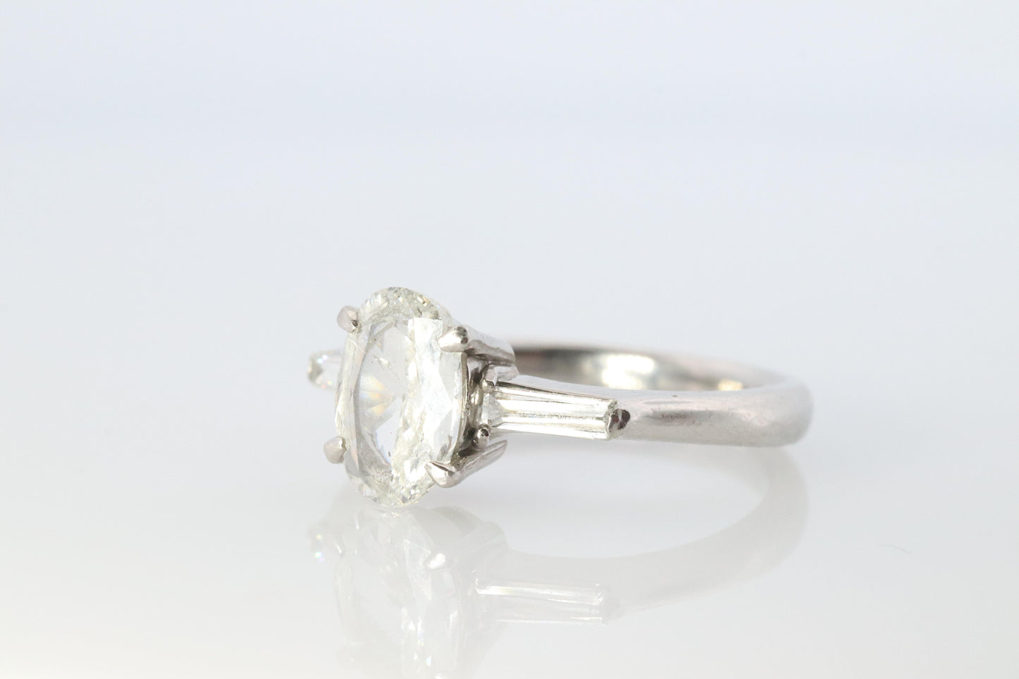 LARGE Diamond Oval engagement ring. Platinum 1CT Oval Diamond Solitaire baguette