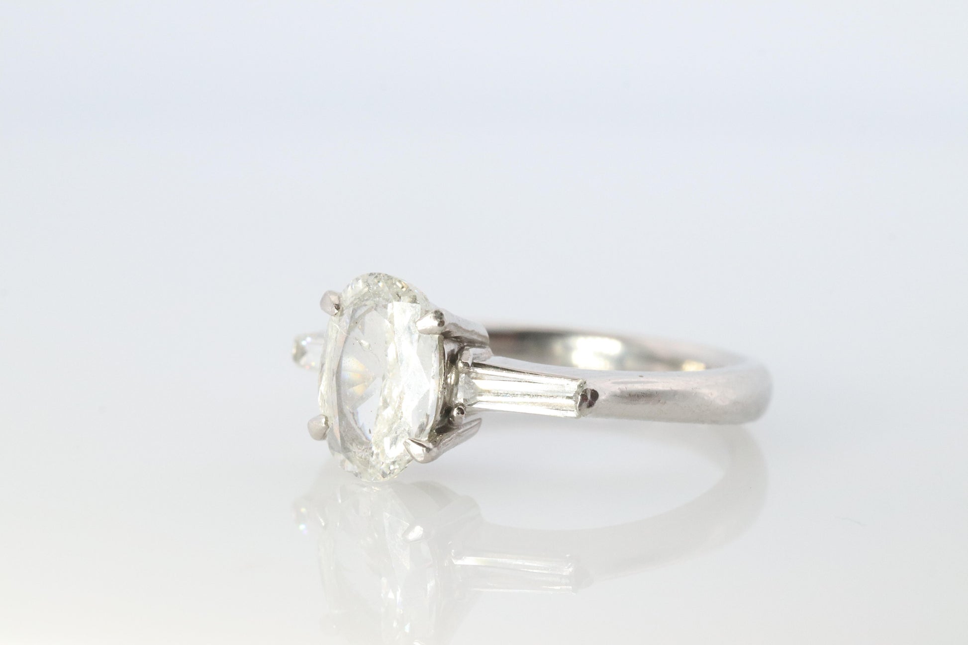 LARGE Diamond Oval engagement ring. Platinum 1CT Oval Diamond Solitaire baguette