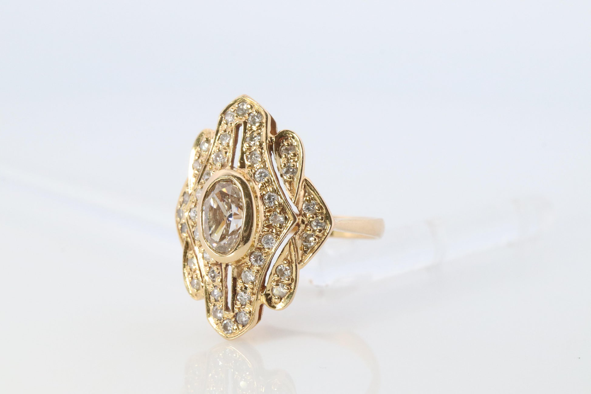 18k Diamond Shield ring 18k yellow gold with diamonds and filigree open design.