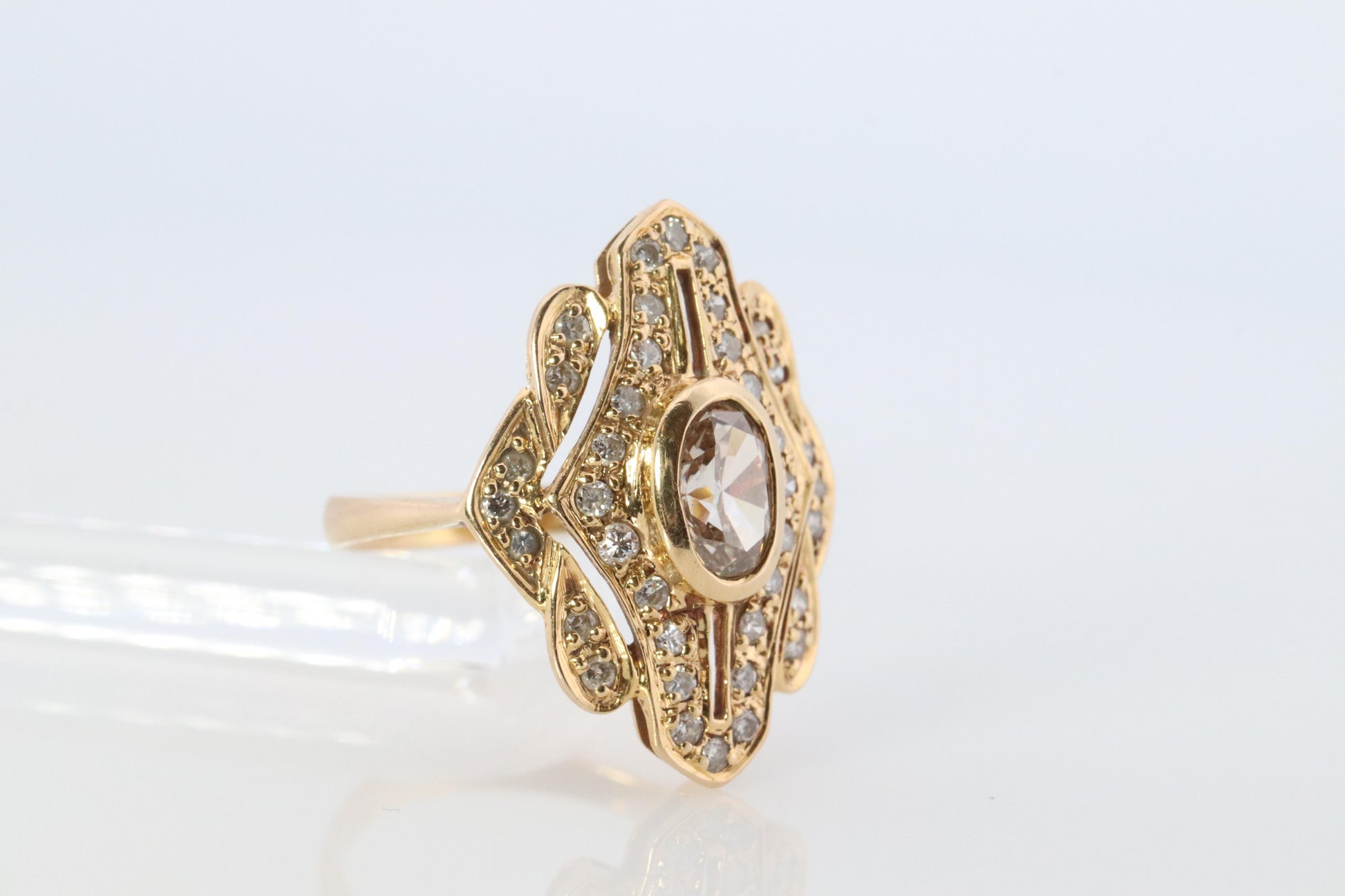 18k Diamond Shield ring 18k yellow gold with diamonds and filigree open design.