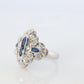 Sapphire shield ring. Platinum Shield Ring. Sapphire and Diamond wide band.