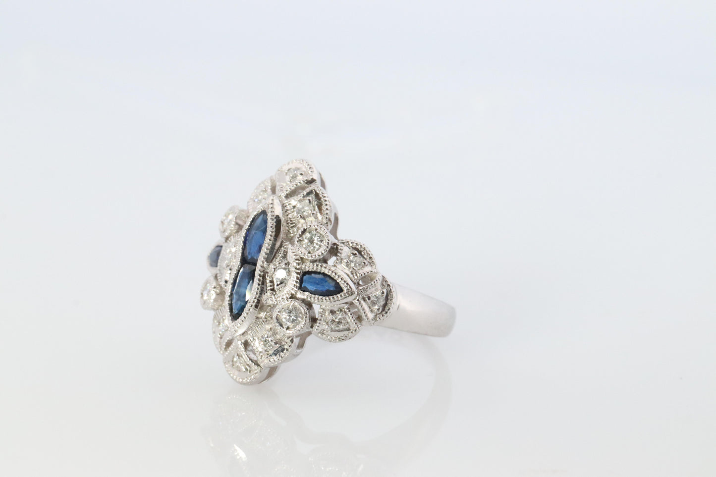 Sapphire shield ring. Platinum Shield Ring. Sapphire and Diamond wide band.