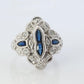 Sapphire shield ring. Platinum Shield Ring. Sapphire and Diamond wide band.