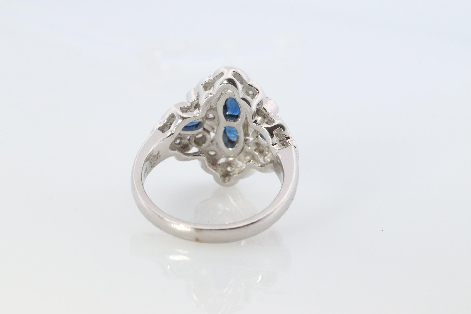 Sapphire shield ring. Platinum Shield Ring. Sapphire and Diamond wide band.