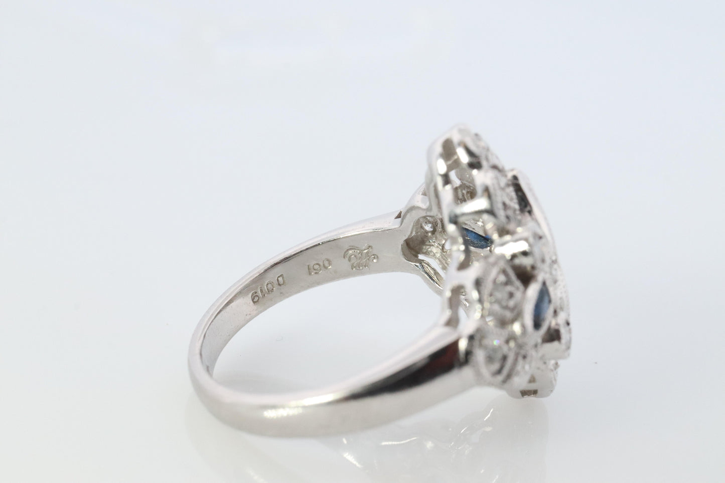 Sapphire shield ring. Platinum Shield Ring. Sapphire and Diamond wide band.