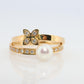 Mikimoto Ring. Vintage 18k Gold Mikimoto Pearl Diamond flower bypass ring