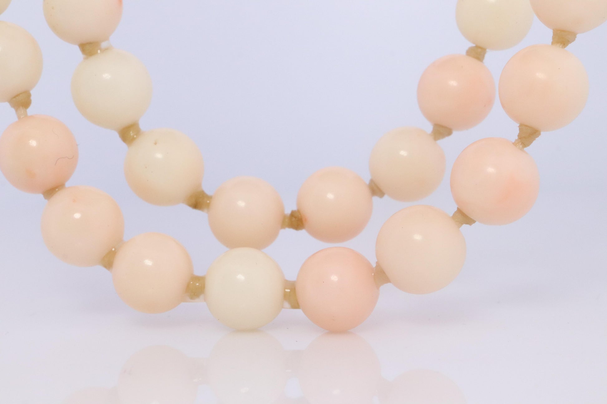 14k Coral Carved Angel Skin Salmon Bead Necklace. Two Strand Peach White Coral
