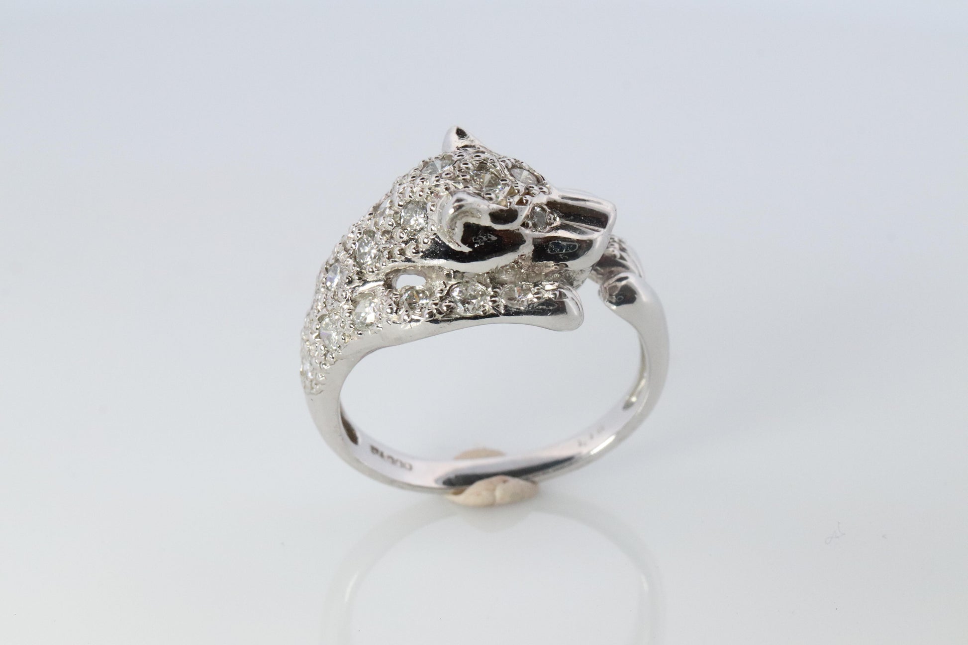 Panther Leopard Jaguar Cheetah Platinum ring. Diamond Encrusted Head band.