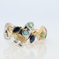 Cosmic ring. 18k and Platinum Rocket Space Planetary theme band.