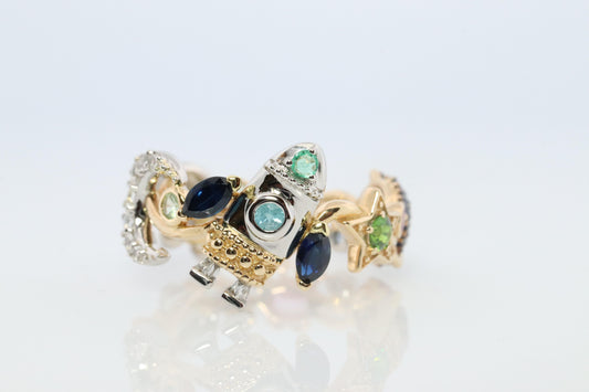 Cosmic ring. 18k and Platinum Rocket Space Planetary theme band.