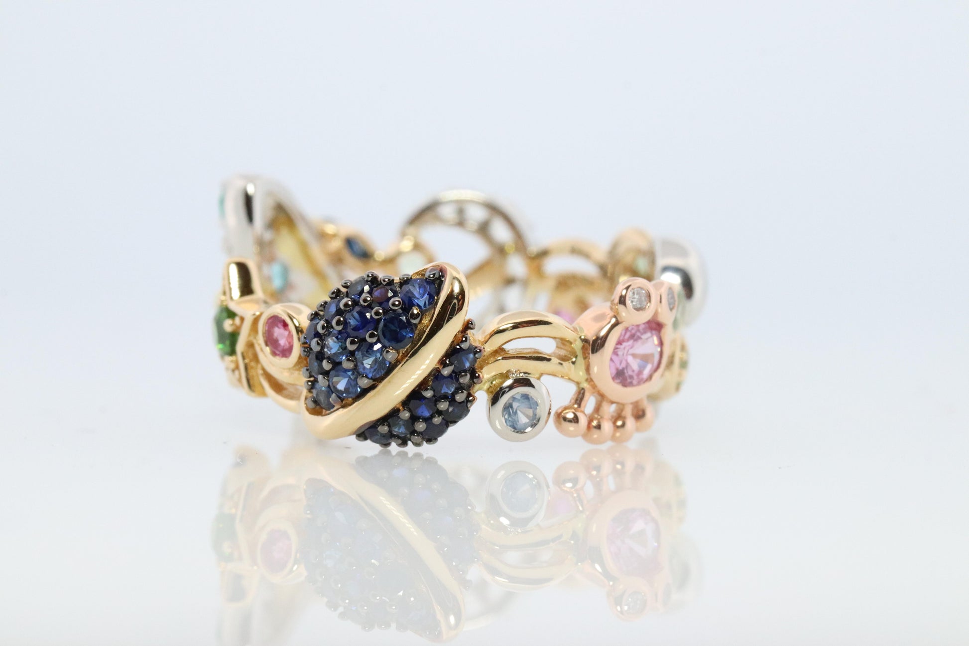 Cosmic ring. 18k and Platinum Rocket Space Planetary theme band.