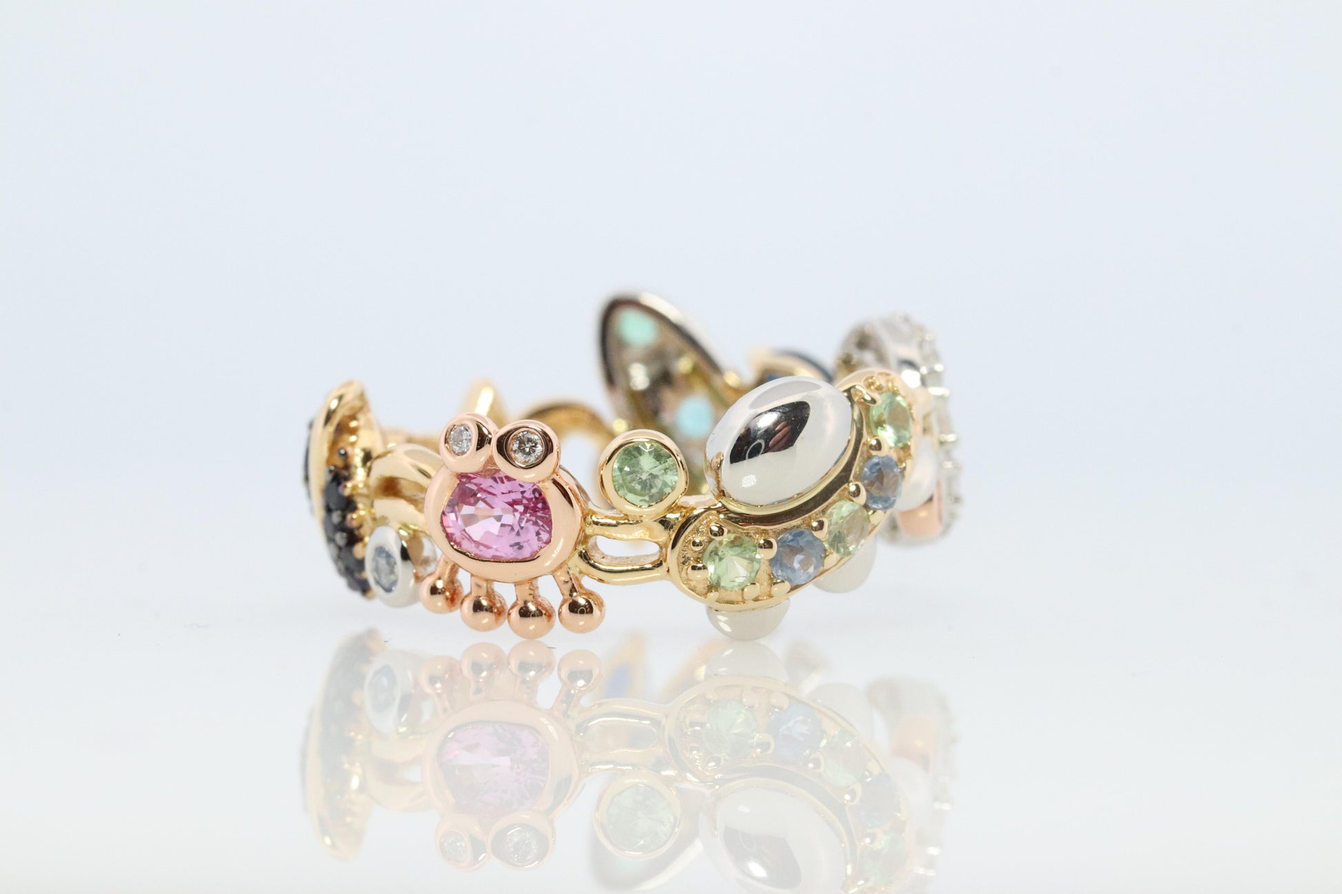 Cosmic ring. 18k and Platinum Rocket Space Planetary theme band.