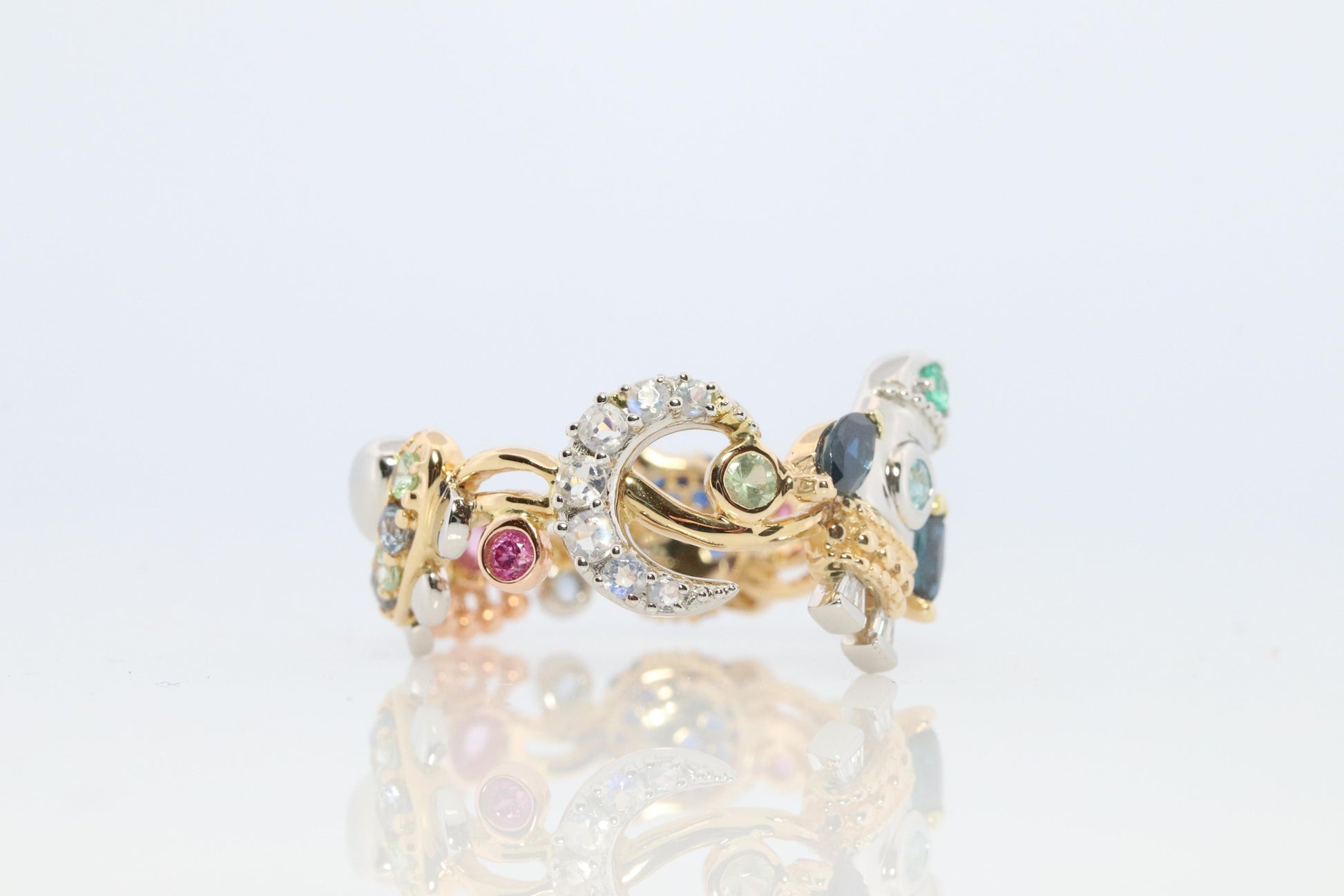 Cosmic ring. 18k and Platinum Rocket Space Planetary theme band.