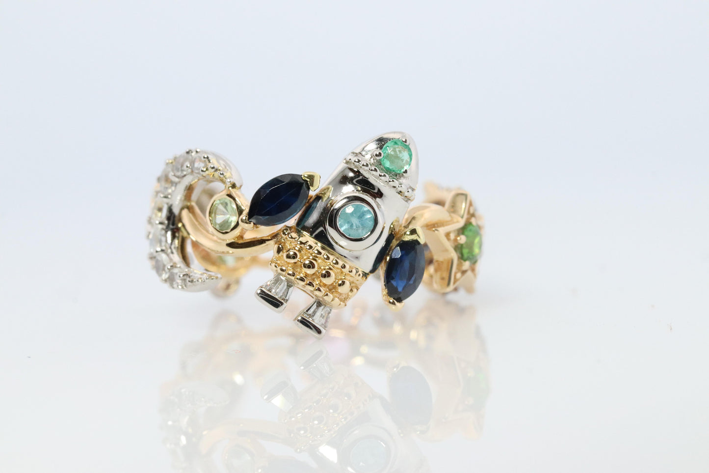 Cosmic ring. 18k and Platinum Rocket Space Planetary theme band.