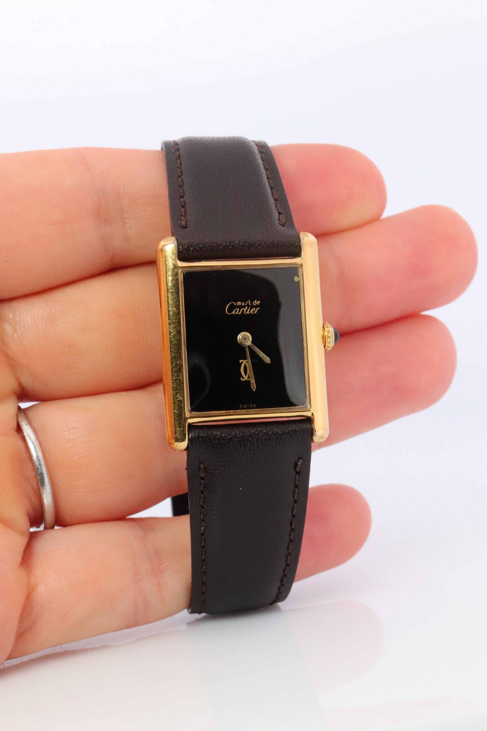 Vintage Must de Cartier Mystery Tank Watch. ARGENT Manual Black Dial Tank.