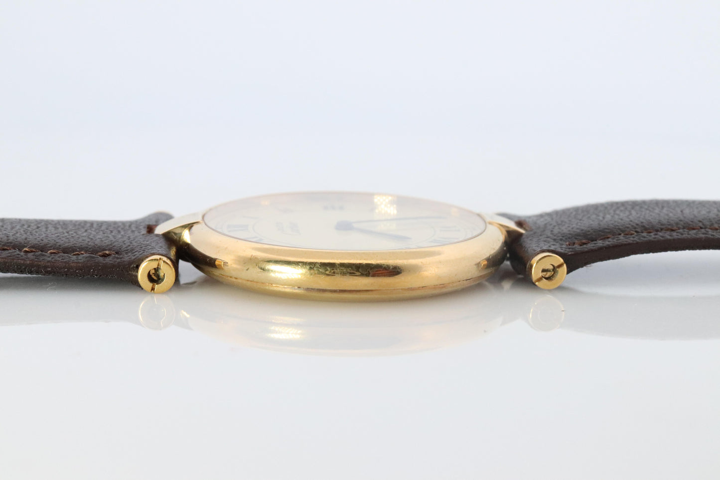 Cartier Watch. Must de Cartier Champagne Dial Vendome Round Argent Vermeil 30mm.