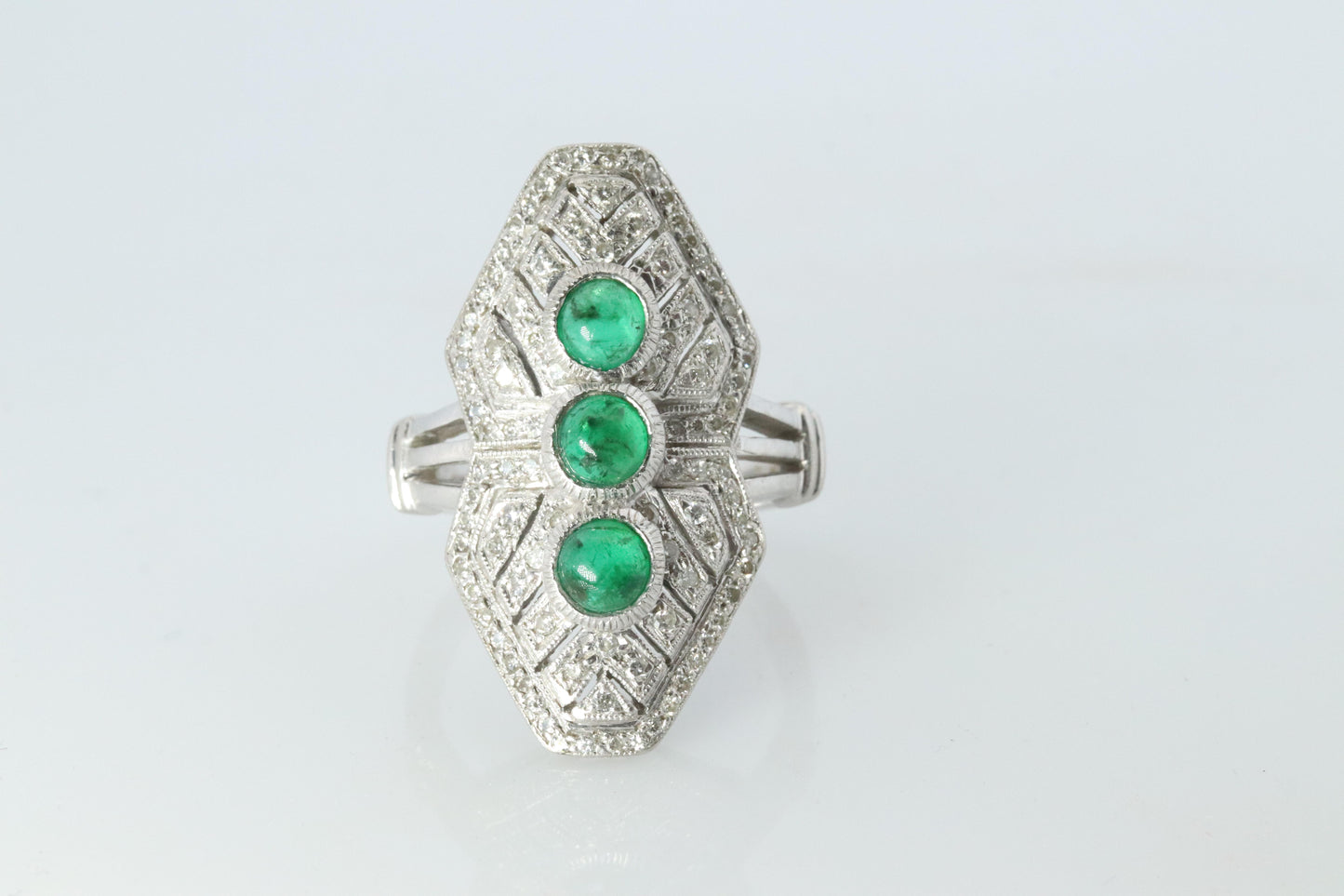 Emerald shield ring. Platinum Shield Ring Emerald Cabochon and Diamond wide band
