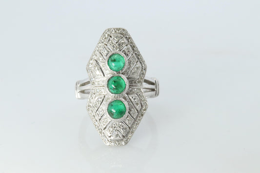 Emerald shield ring. Platinum Shield Ring Emerald Cabochon and Diamond wide band
