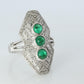 Emerald shield ring. Platinum Shield Ring Emerald Cabochon and Diamond wide band
