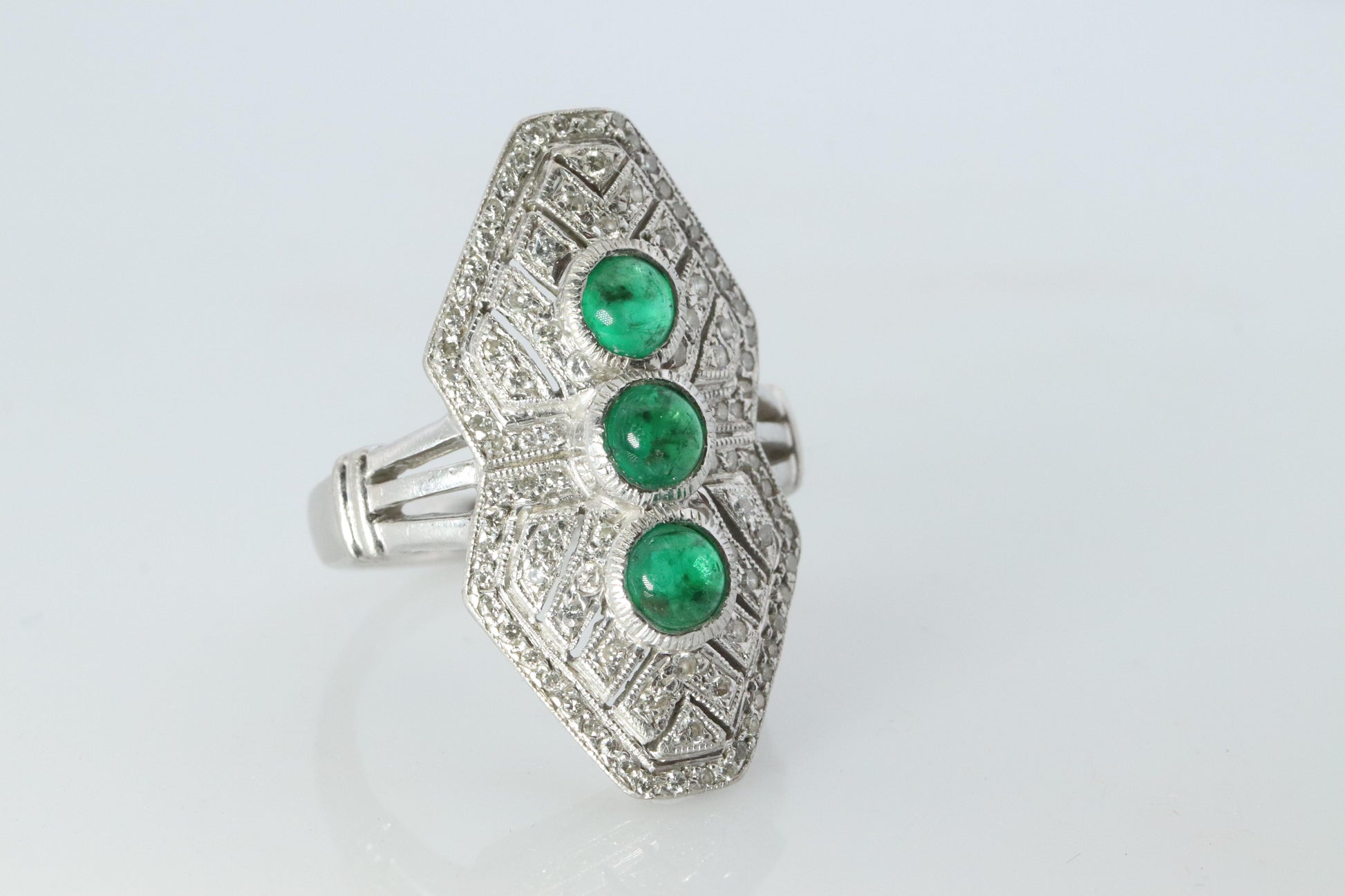 Emerald shield ring. Platinum Shield Ring Emerald Cabochon and Diamond wide band