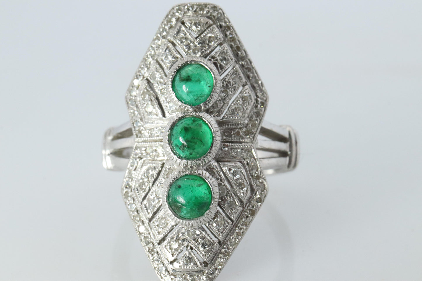 Emerald shield ring. Platinum Shield Ring Emerald Cabochon and Diamond wide band