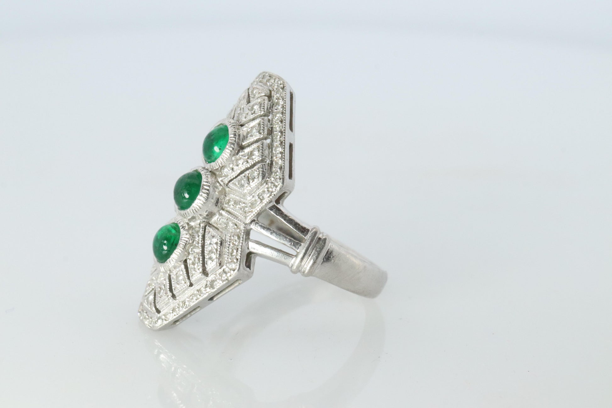 Emerald shield ring. Platinum Shield Ring Emerald Cabochon and Diamond wide band