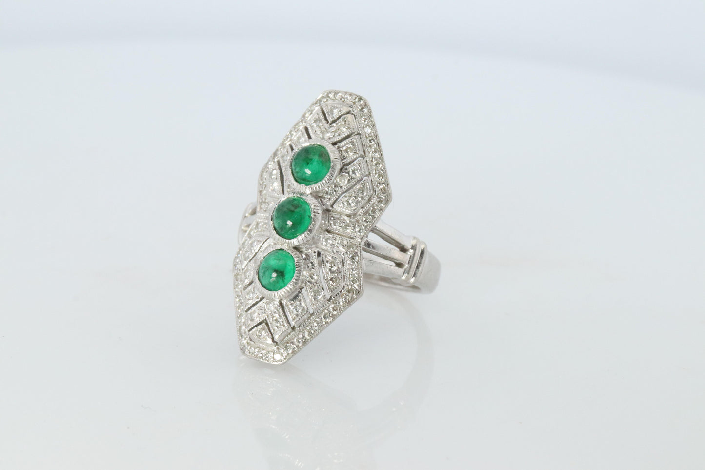 Emerald shield ring. Platinum Shield Ring Emerald Cabochon and Diamond wide band