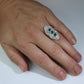 Emerald shield ring. Platinum Shield Ring Emerald Cabochon and Diamond wide band