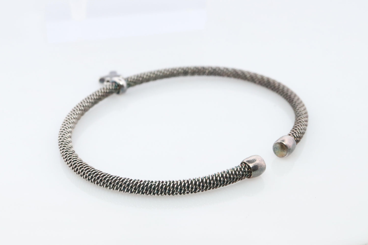 Tiffany & Co. Bracelet. Tiffany Stretch Bangle Cross Dangle Sterling Silver
