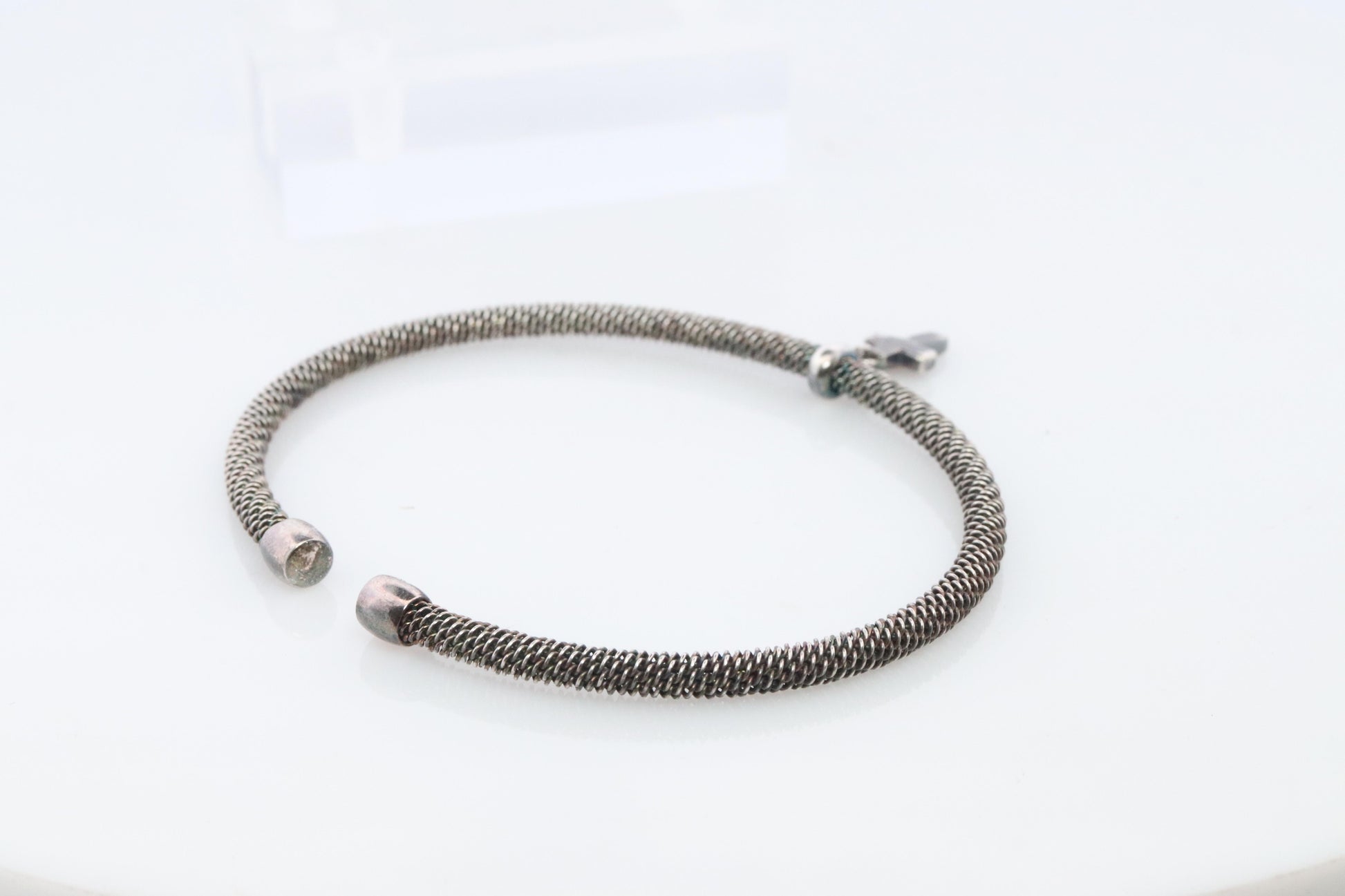 Tiffany & Co. Bracelet. Tiffany Stretch Bangle Cross Dangle Sterling Silver