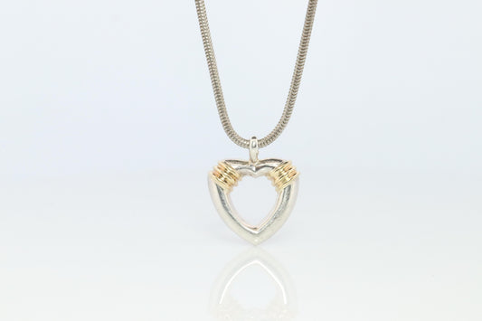 Tiffany and Co Open Heart Pendant. 18k and Sterling Silver