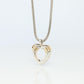 Tiffany and Co Open Heart Pendant. 18k and Sterling Silver