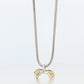 Tiffany and Co Open Heart Pendant. 18k and Sterling Silver