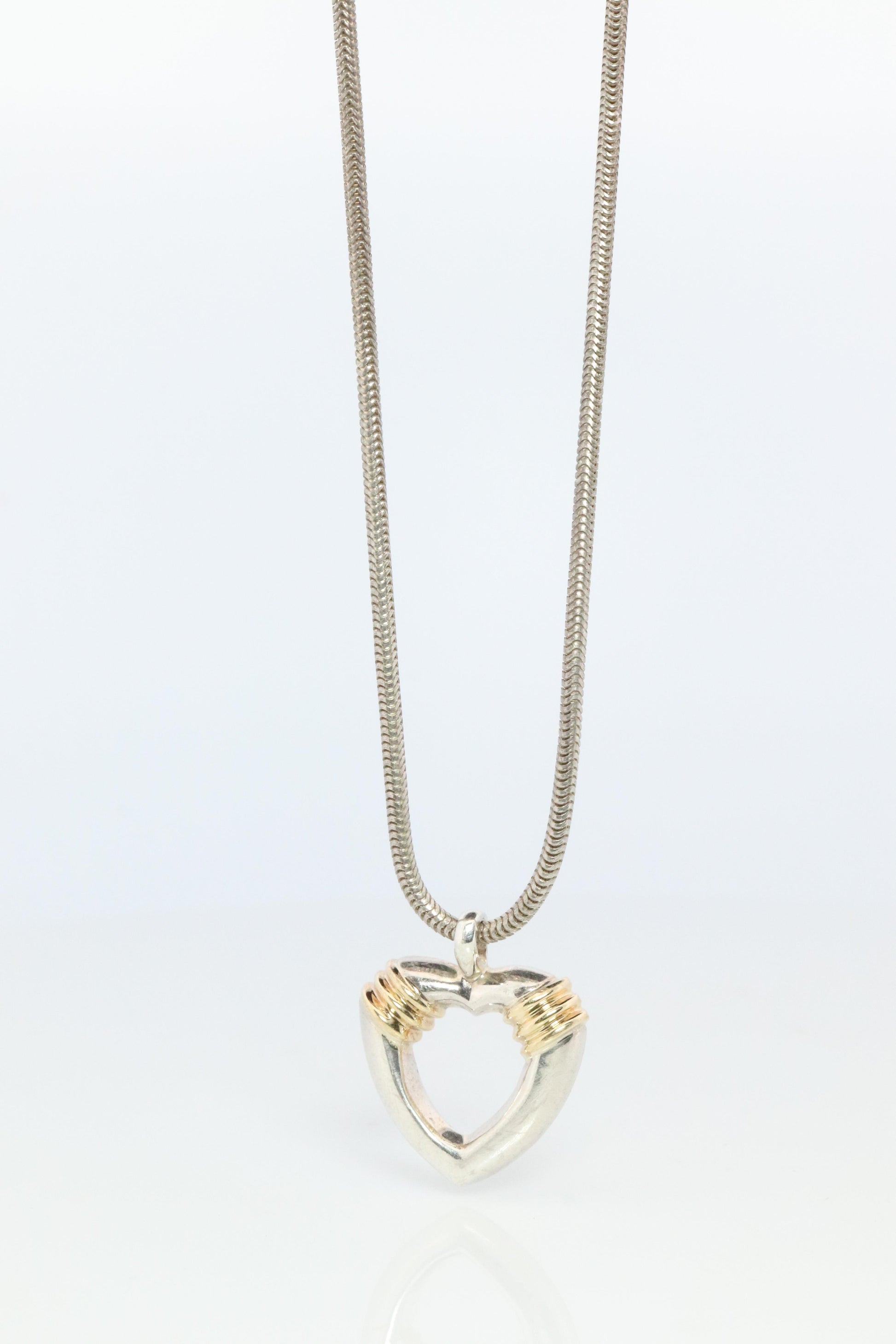 Tiffany and Co Open Heart Pendant. 18k and Sterling Silver