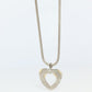 Tiffany and Co Open Heart Pendant. 18k and Sterling Silver