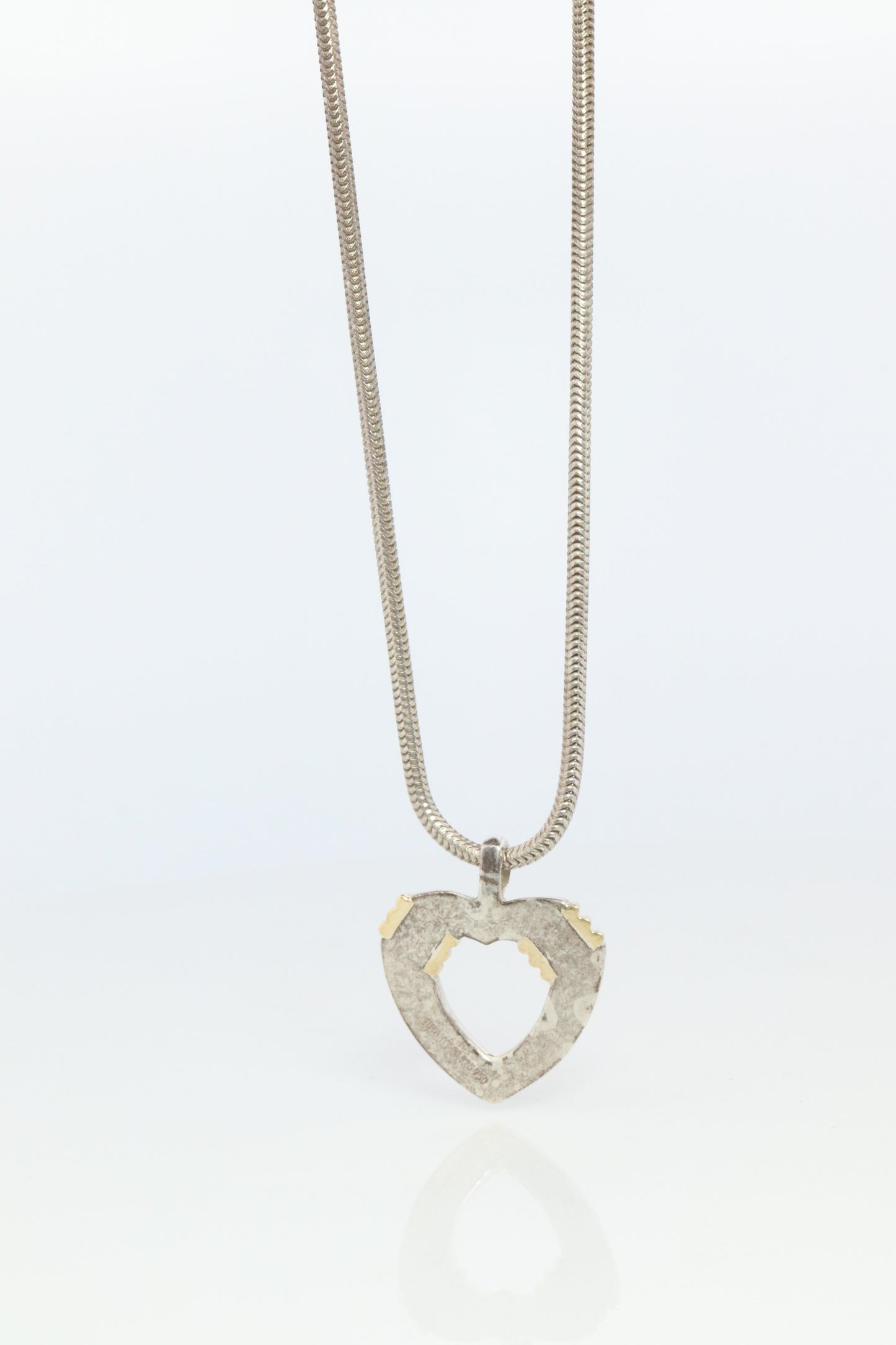 Tiffany and Co Open Heart Pendant. 18k and Sterling Silver
