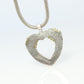 Tiffany and Co Open Heart Pendant. 18k and Sterling Silver