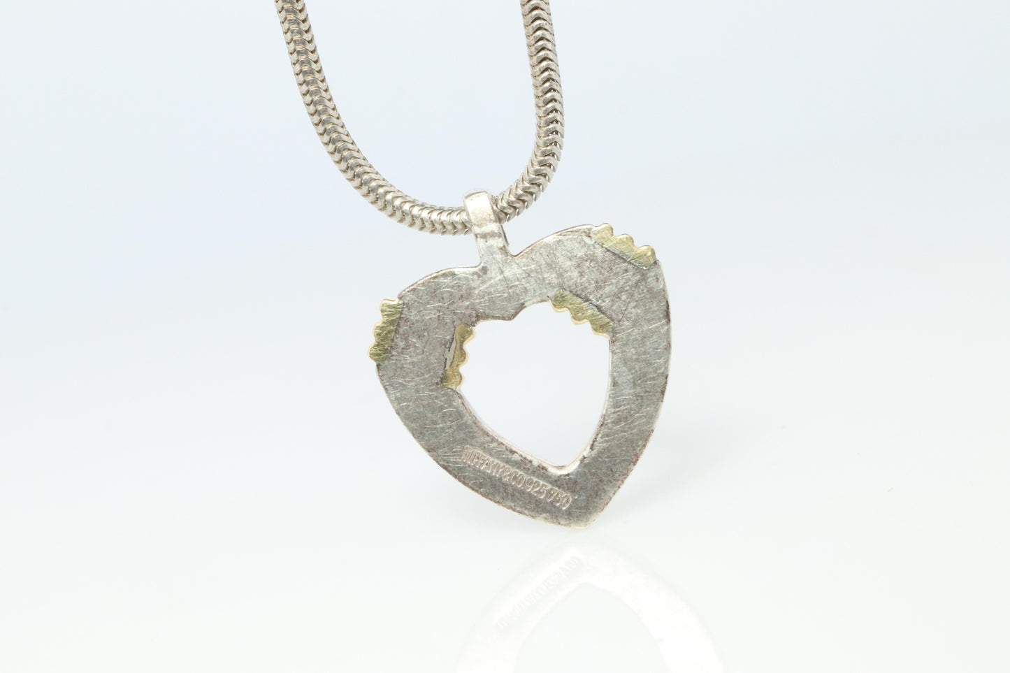 Tiffany and Co Open Heart Pendant. 18k and Sterling Silver