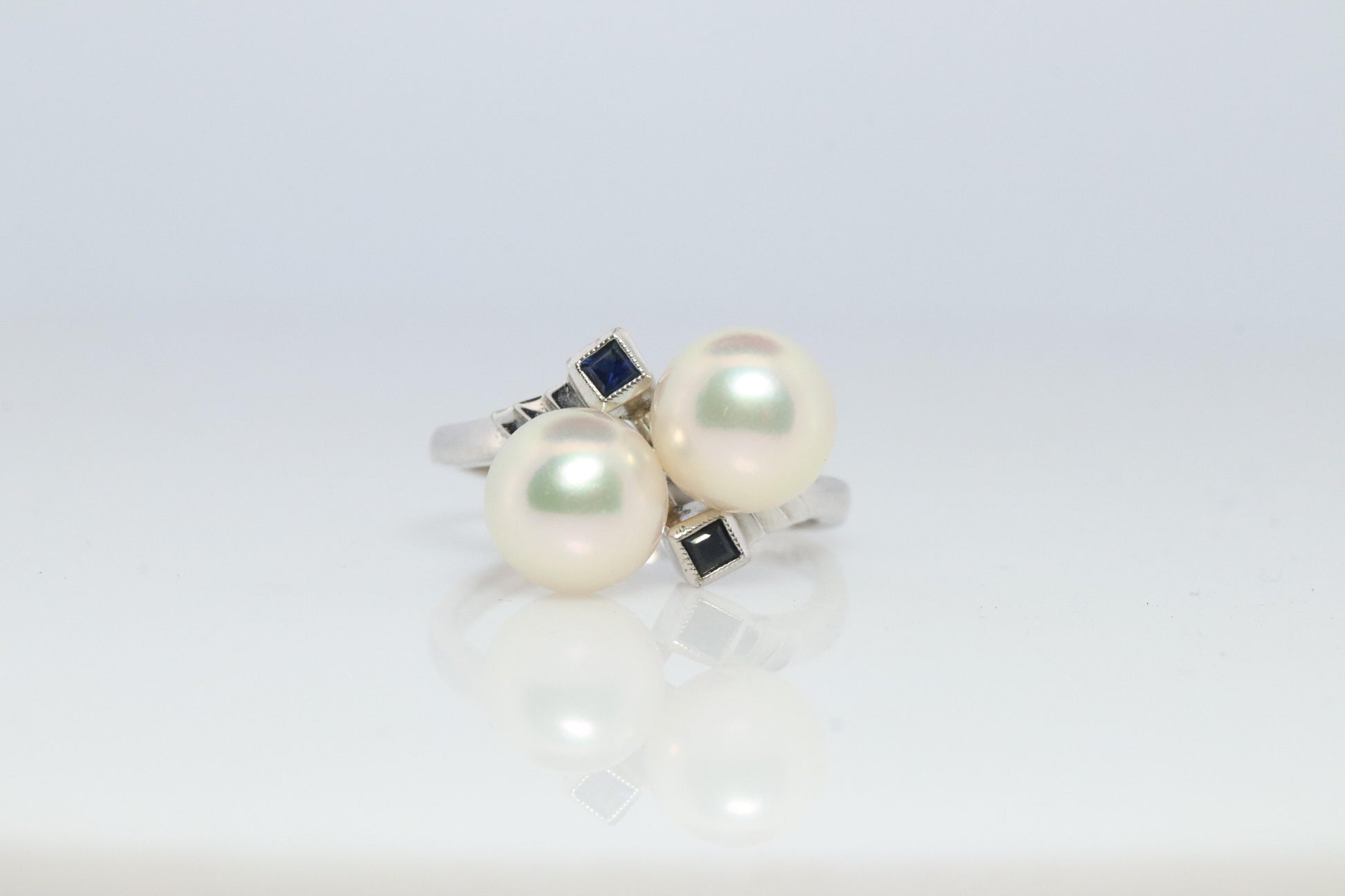 Mikimoto Sapphire Pearl Ring. 14k Mikimoto Sapphire Twin Pearl Bypass band.