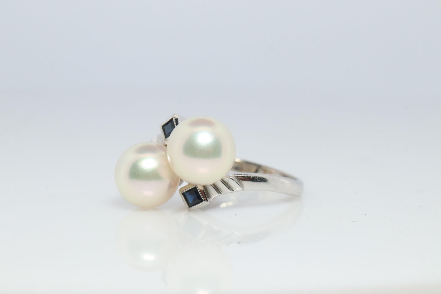 Mikimoto Sapphire Pearl Ring. 14k Mikimoto Sapphire Twin Pearl Bypass band.