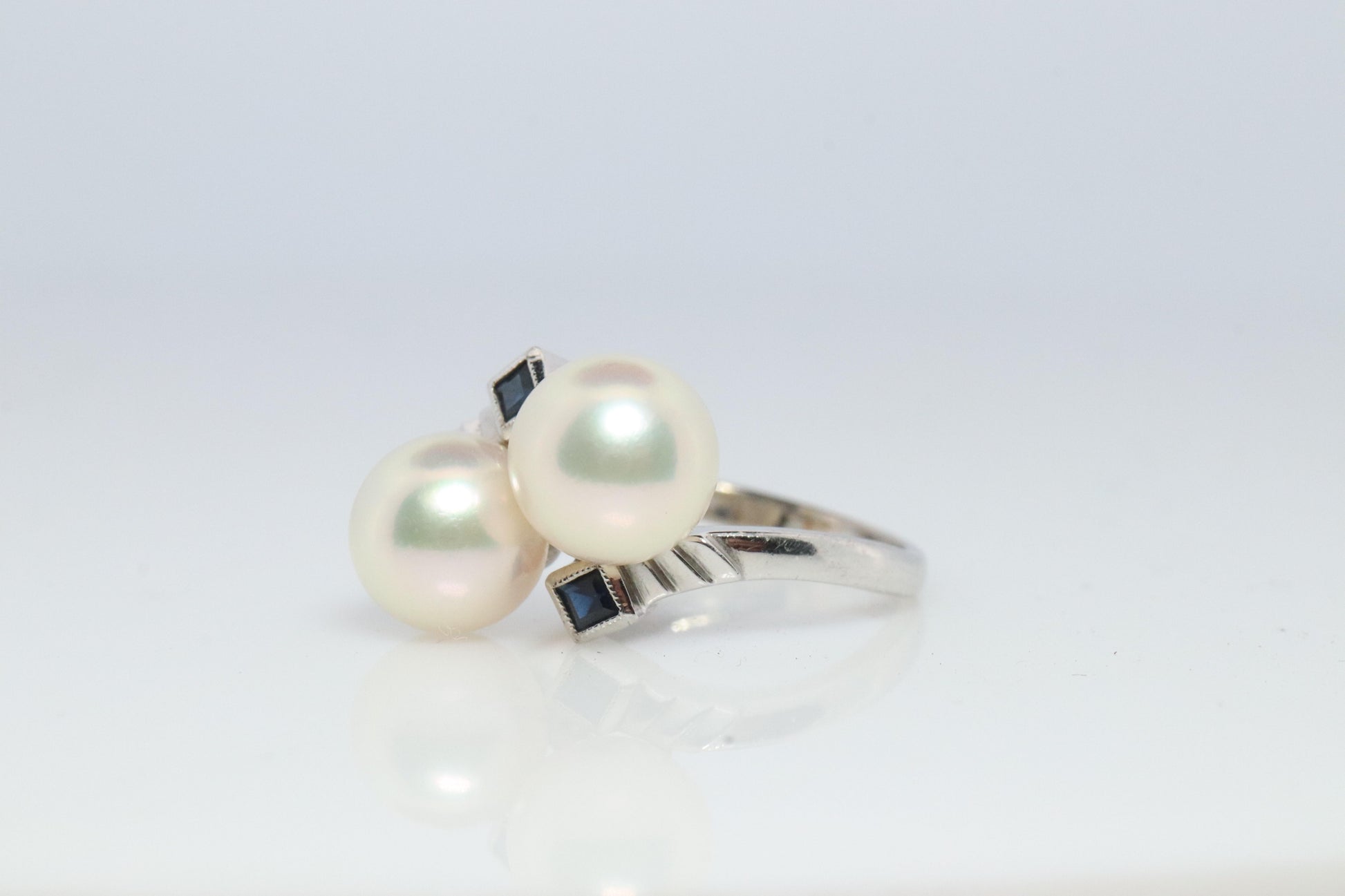 Mikimoto Sapphire Pearl Ring. 14k Mikimoto Sapphire Twin Pearl Bypass band.