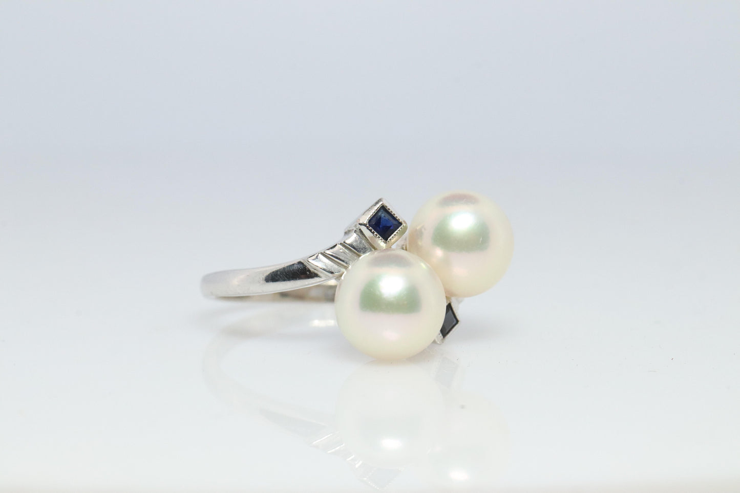 Mikimoto Sapphire Pearl Ring. 14k Mikimoto Sapphire Twin Pearl Bypass band.