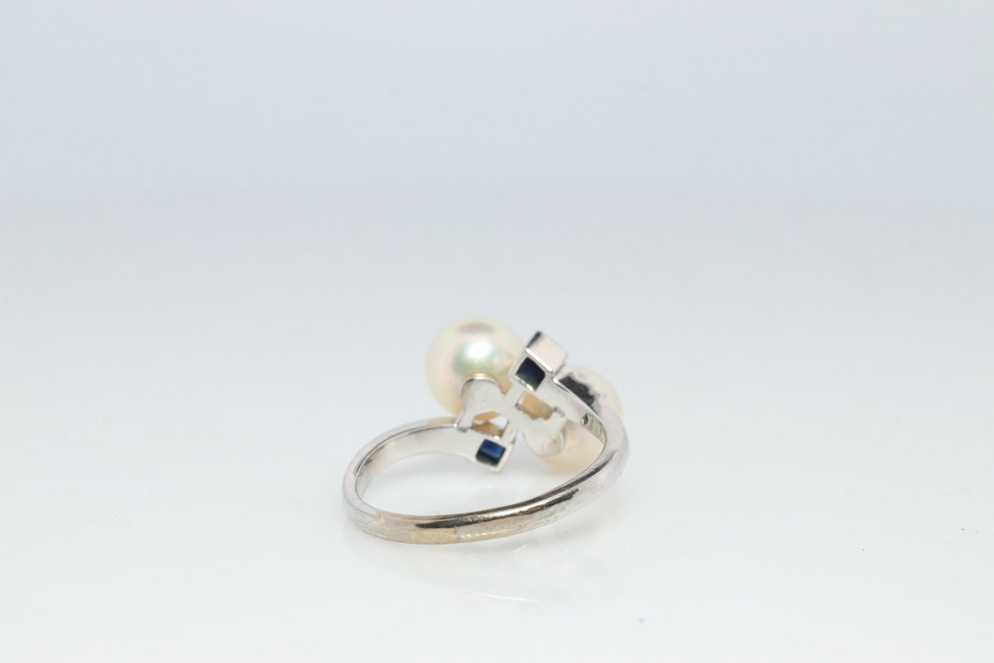 Mikimoto Sapphire Pearl Ring. 14k Mikimoto Sapphire Twin Pearl Bypass band.