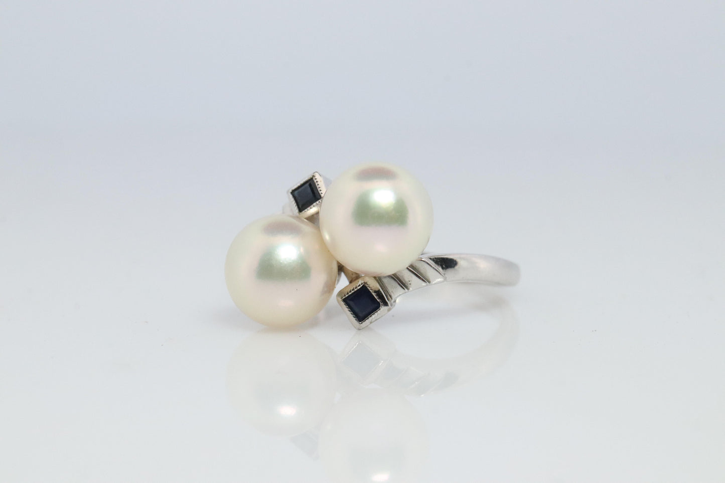 Mikimoto Sapphire Pearl Ring. 14k Mikimoto Sapphire Twin Pearl Bypass band.