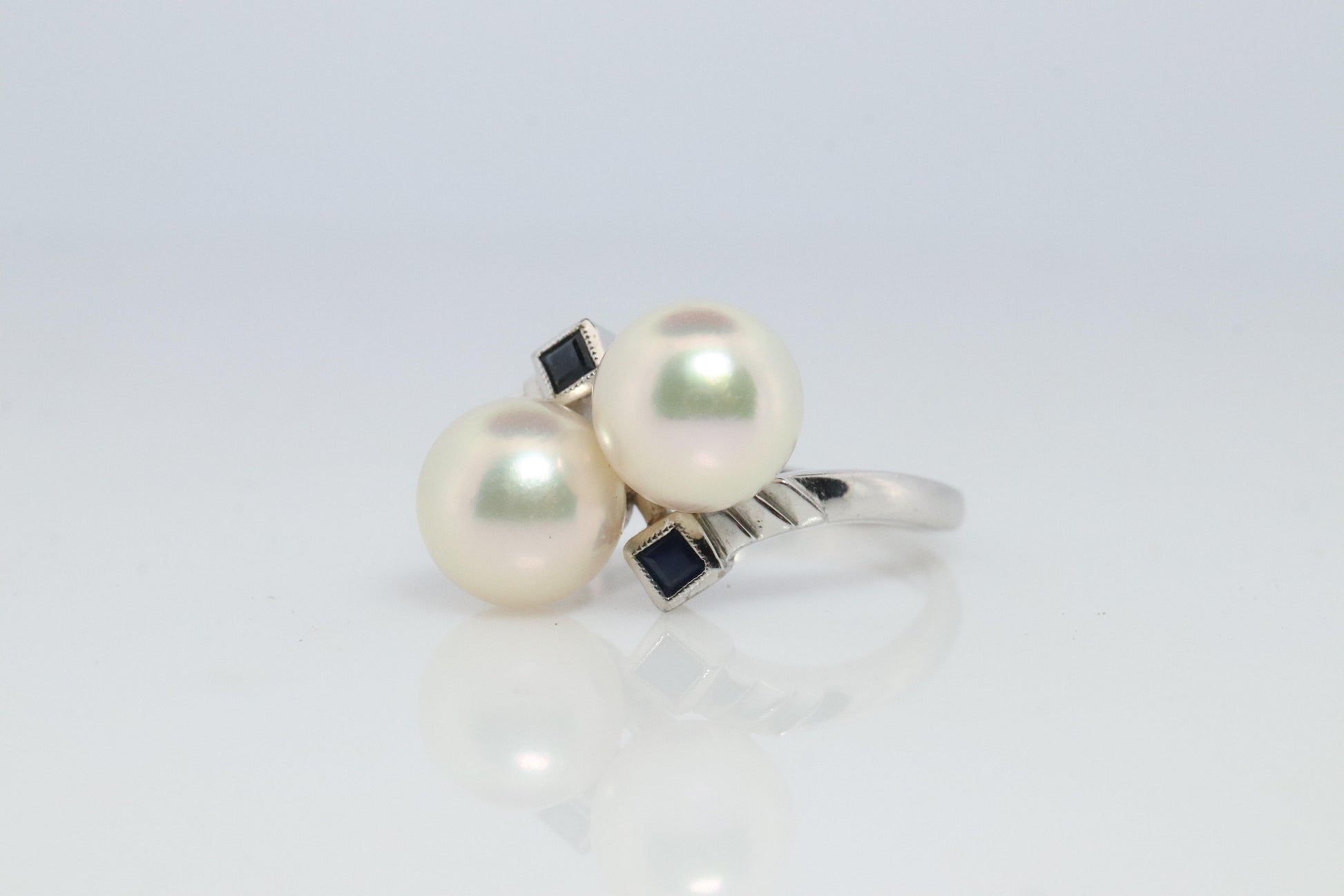 Mikimoto Sapphire Pearl Ring. 14k Mikimoto Sapphire Twin Pearl Bypass band.