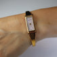 Vintage GUCCI 1500L Quartz Wrist Watch. Gucci Gold tone LOGO Bangle Watch