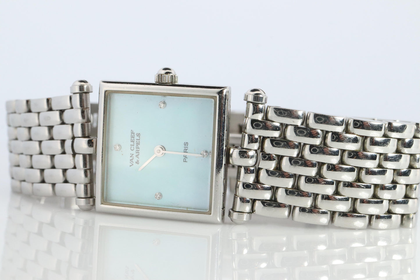 Van Cleef and Arpels 522642 watch. Classique Square Blue Shell Dial