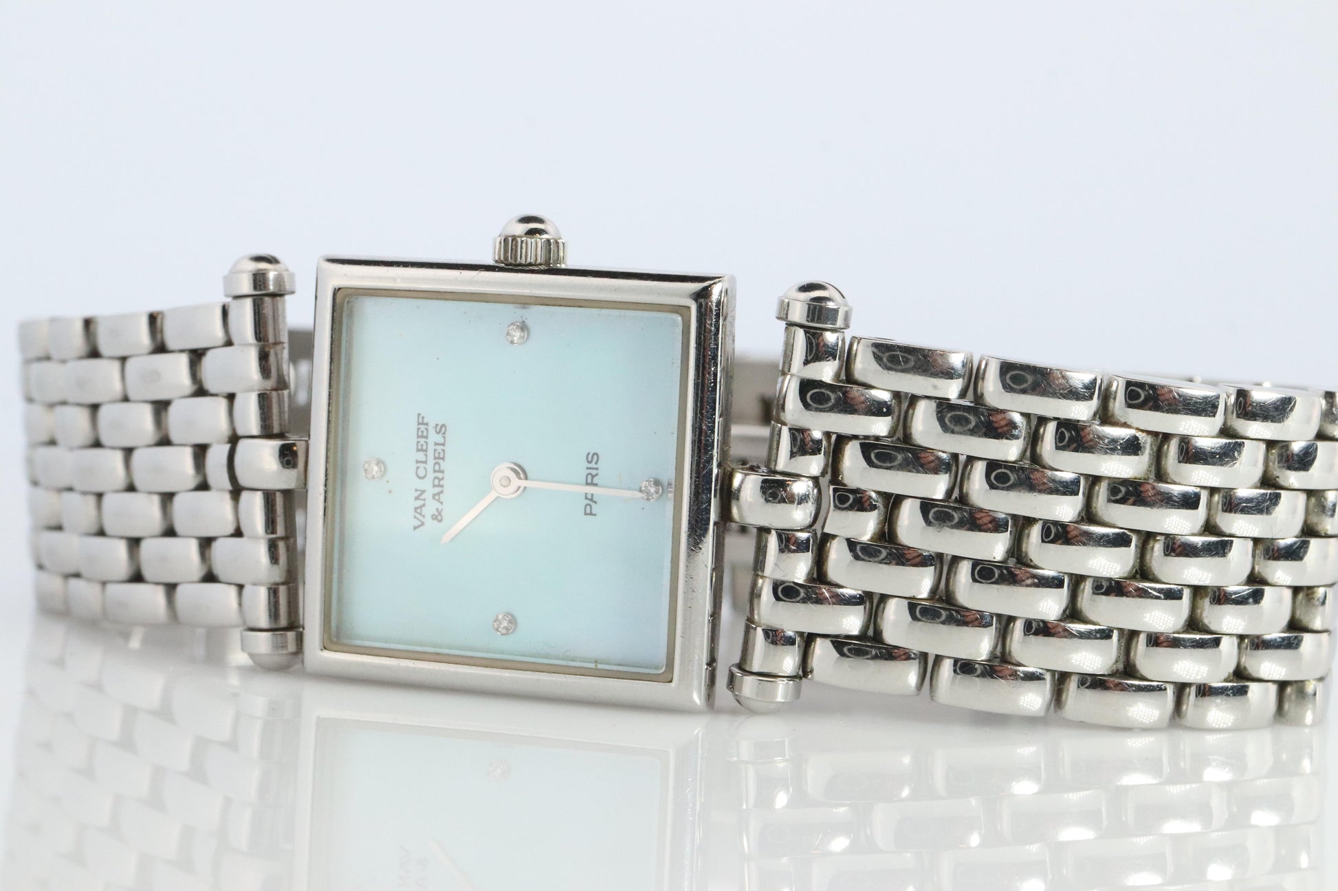 Van Cleef and Arpels 522642 watch. Classique Square Blue Shell Dial