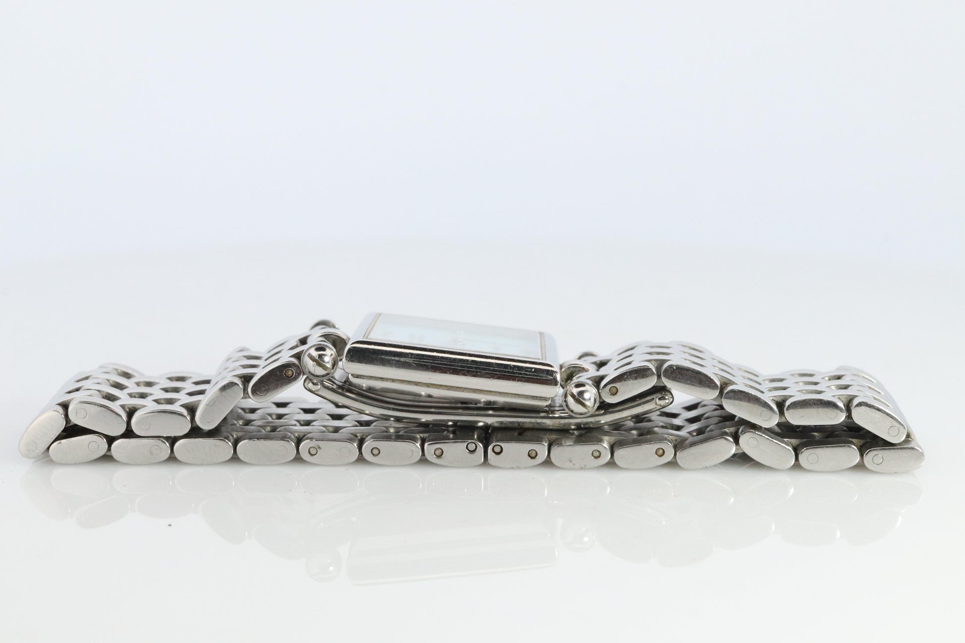 Van Cleef and Arpels 522642 watch. Classique Square Blue Shell Dial