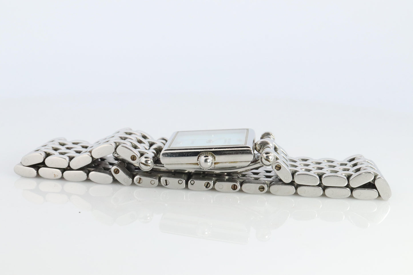 Van Cleef and Arpels 522642 watch. Classique Square Blue Shell Dial